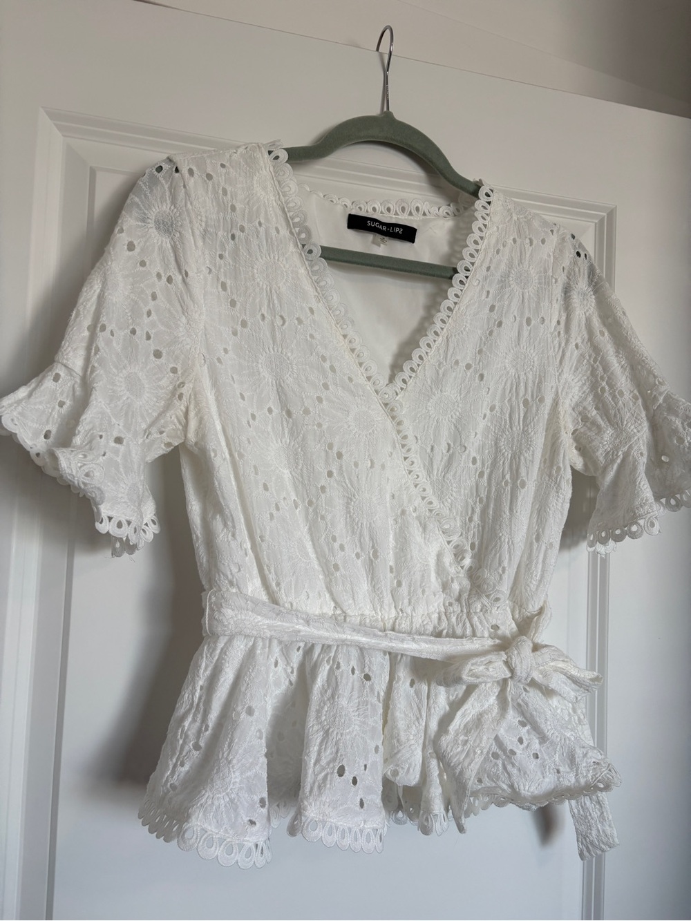 Sugarlips White Eyelet Wrap Peplum Blouse